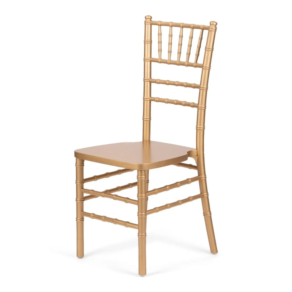 Gold metal chair with a white background