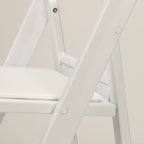 Silla plegable de resina blanca TitanPRO™ 100 unidades